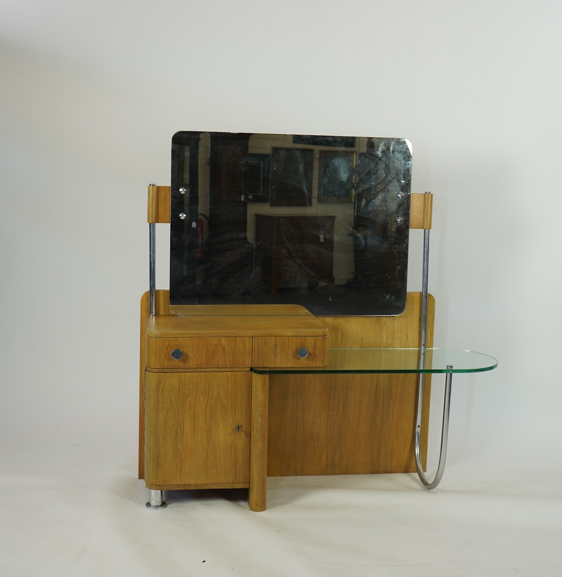A Belgian Art Deco modernist walnut dressing table, by De Coene